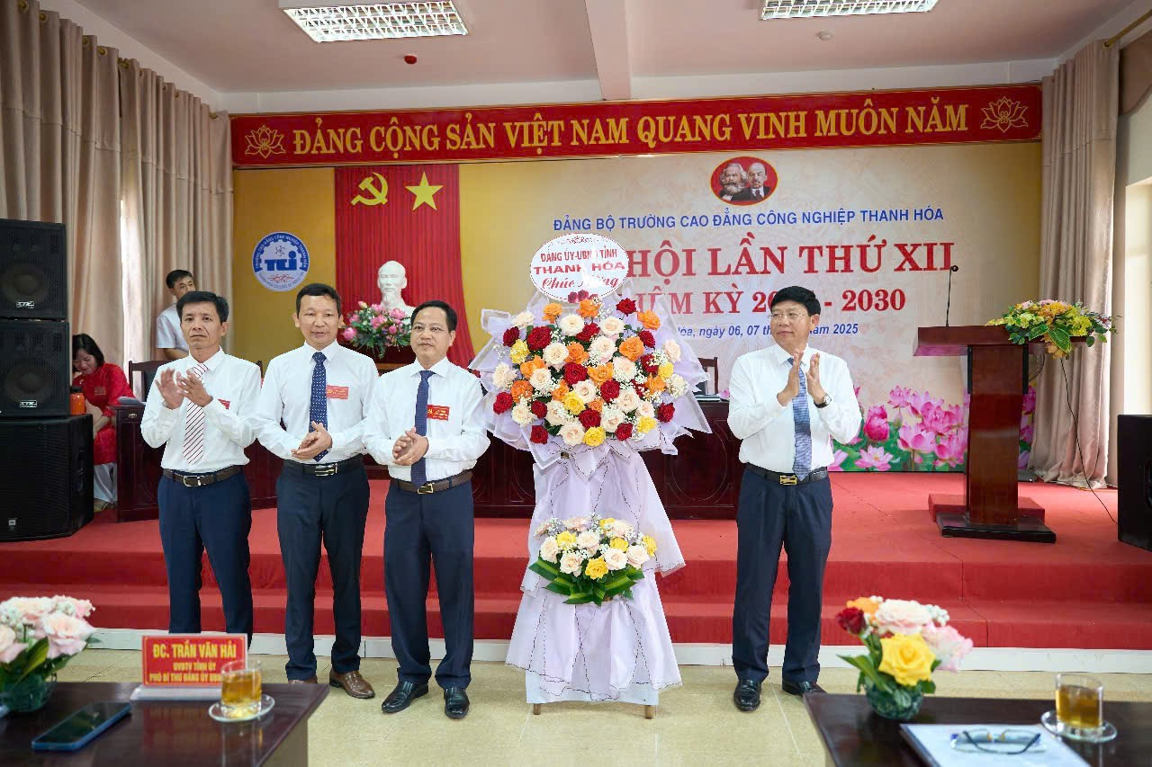 ''A group of men standing in front of a bouquet of flowers

AI-generated content may be incorrect.''